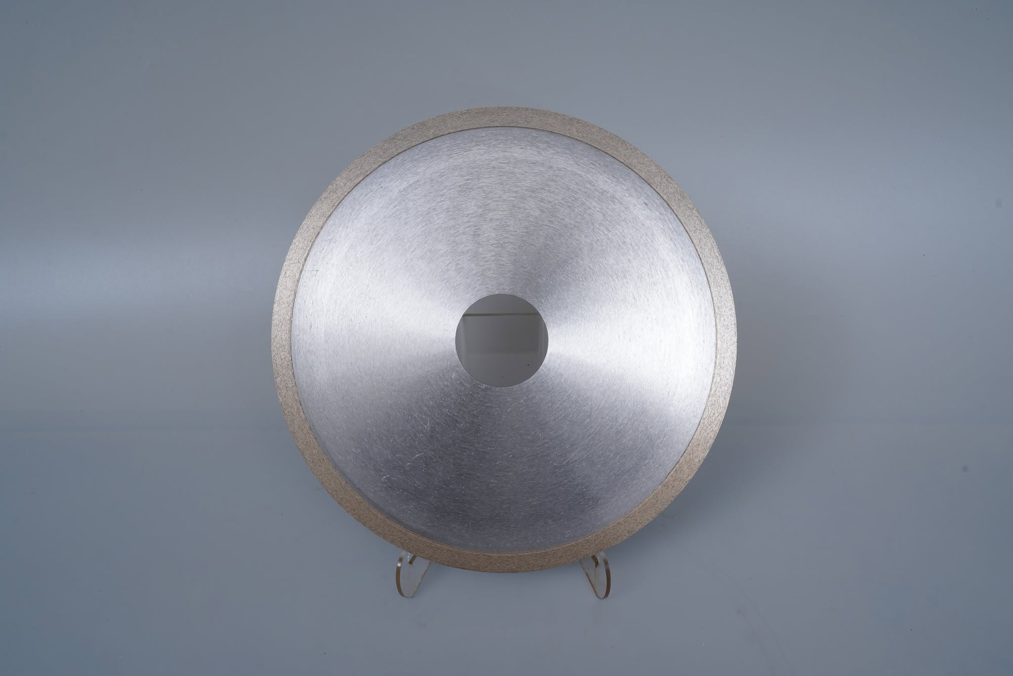 Continuous rim ceramic saw blade